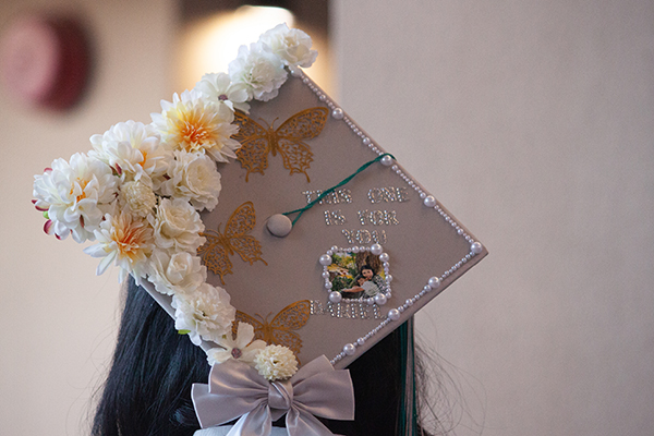 Closeup of a girl's decorated graduation cap